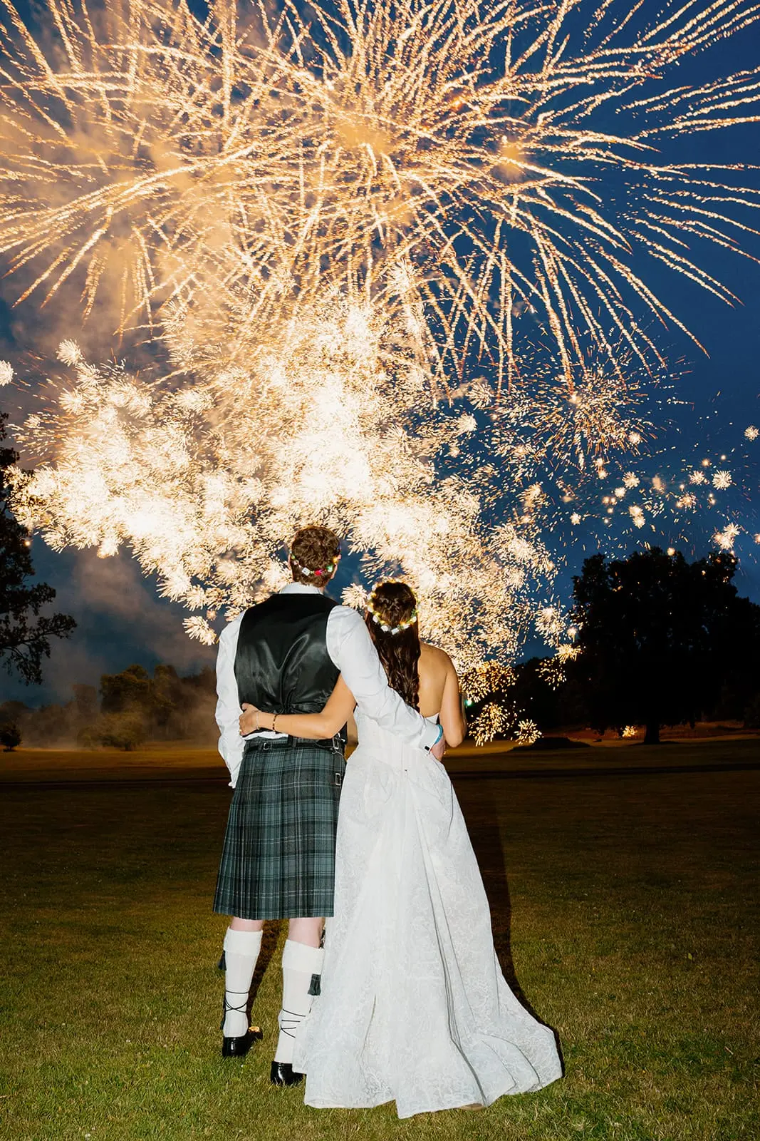 The couple watching fireworks at Dundas Castle
